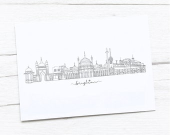 May include: A black and white line drawing of the Brighton skyline, featuring the Royal Pavilion and the Palace Pier. The text "Brighton" is written below the skyline.