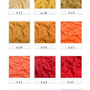 May include: A collection of 12 fabric swatches in various colours, including yellow, orange, red, white, and blue. The swatches are arranged in a grid pattern and labelled with numbers. The text "MUSLIN 100% Cotton @senera.wear" is displayed at the top of the image.