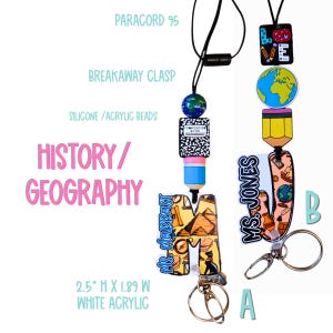 May include: Two lanyards with history and geography themes. One features an "M" with pyramids and a cat, the other a "J" with a globe and pencil. Both have silicone beads, breakaway clasps, and the text "Ms. Jones" and "Ms. Marrast".