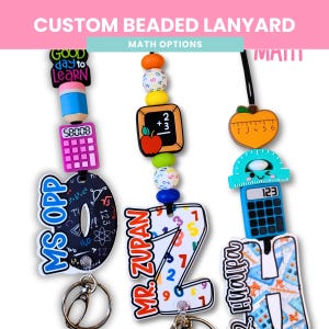 May include: Custom beaded lanyards with math-themed charms. The lanyards feature colorful beads and charms shaped like a calculator, apple, and ruler. The text "CUSTOM BEADED LANYARD" and "MATH OPTIONS" are visible.