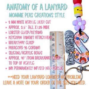 May include: A lanyard with a teacher-themed design, featuring a pencil charm, flower bead, and a clear acrylic tag that reads "Mrs. Sinkfield." The lanyard includes a breakaway clasp and is approximately 40 inches (101.6 cm) long.