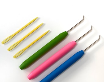Weefgetouwnaalden set van 3. Blauwe, roze en groene weefgetouwstokjes en wolnaalden
