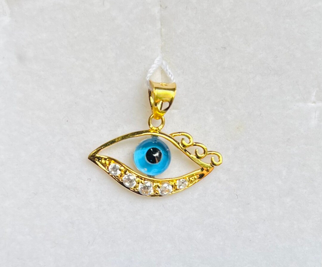 Gold evil hotsell eye pendant necklace
