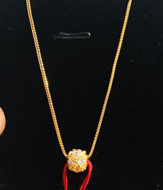916 gold shop thali chain