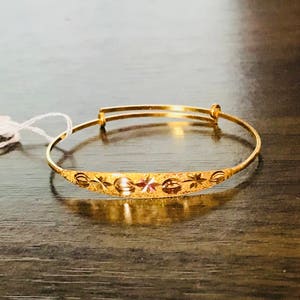 Gold churi for baby clearance