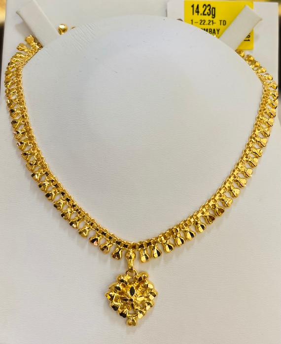 Simple gold necklace indian designs best sale