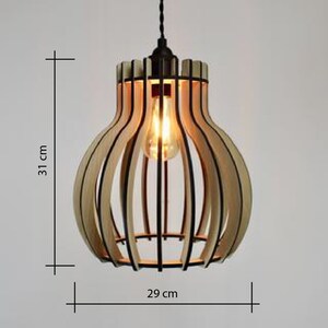 May include: A wooden pendant light with a natural wood finish and black metal accents. The light is 31 inches tall and 29 inches wide.
