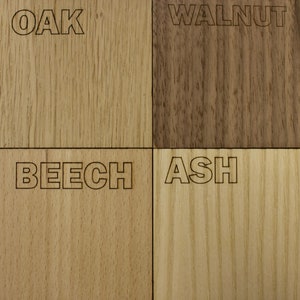 May include: Close-up of four wood samples labeled "Oak", "Walnut", "Beech", and "Ash".