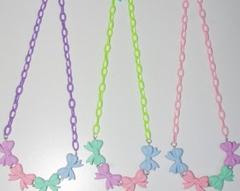 Pastel hairbow charm necklace.