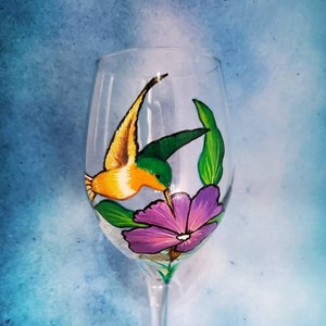Hand painted Hummingbird with purple flower glass