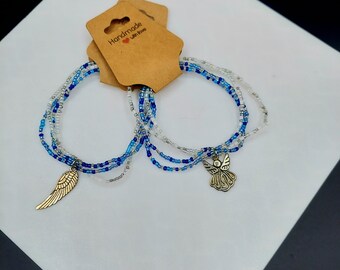 Elegant Glass Beaded Bracelets with Angelic Charms - Set of 4, Versatile Stacking Jewelry