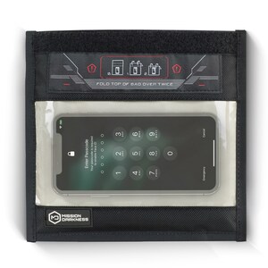 May include: Black pouch with a clear plastic window to hold a smartphone. The pouch has a velcro closure and a label that says "Mission Darkness". The smartphone screen shows a passcode entry screen with the text "Enter Passcode" and "Your passcode is required to enable Face ID". The pouch also has a label that says "Fold top of bag over twice".