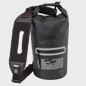 May include: Black waterproof dry bag with a roll-top closure and a shoulder strap. Features a zippered front pocket with a reflective strip and a clear window. The bag has the text "MISSION DARKNESS" printed on it.