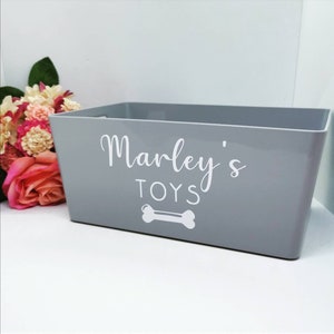 Personalised dog toy storage caddy. Plastic container. Pet tidy.
