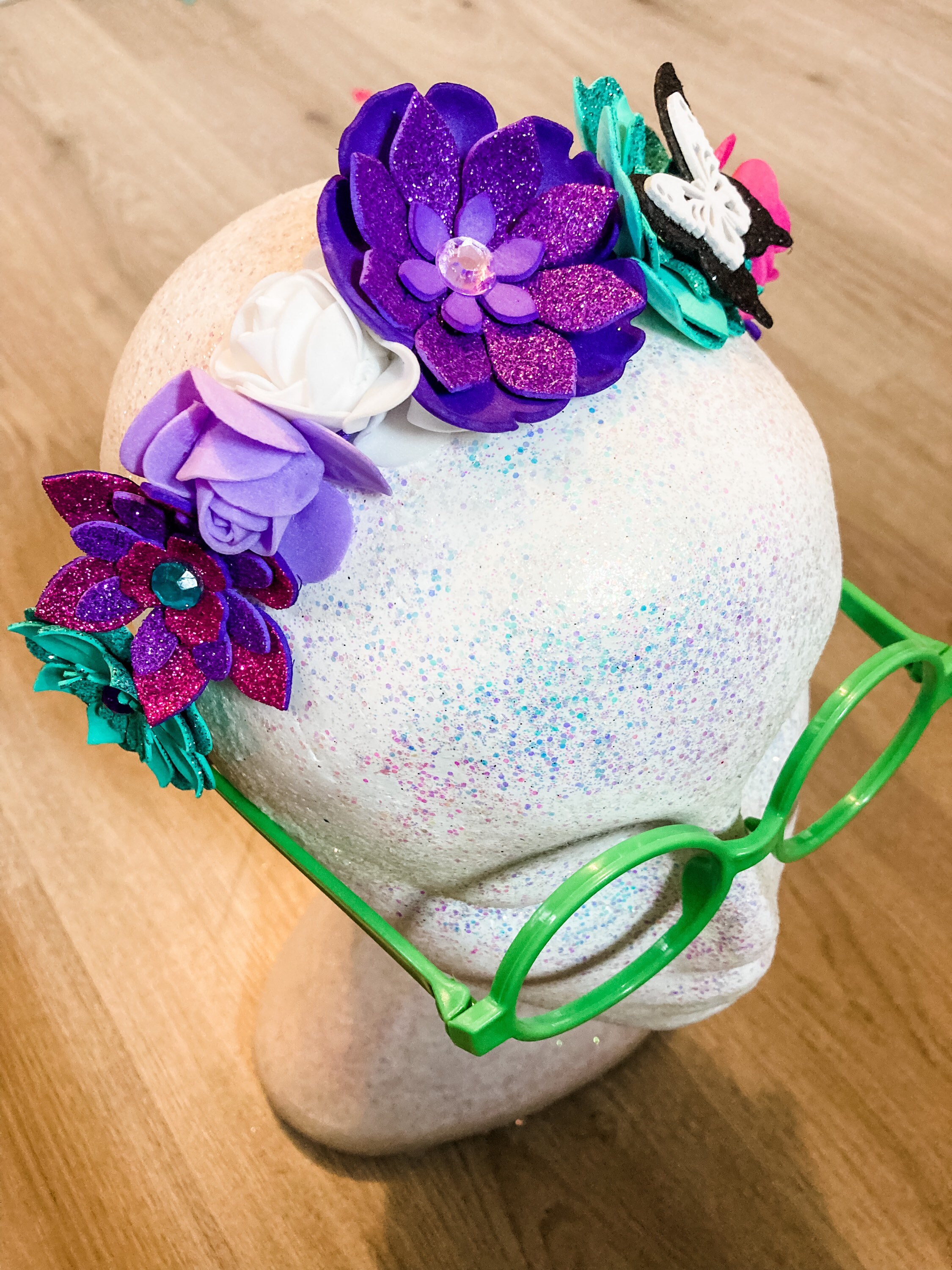 ENCANTO Mirabel Fascia per capelli e occhiali con corona di fiori -   Italia
