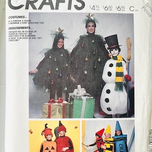 May include: McCall's Crafts pattern 2617 for costumes including a pumpkin, crayon, snowman, and Christmas tree. The envelope features illustrations of these outfits, with text in English and French, and a barcode on the bottom left corner.