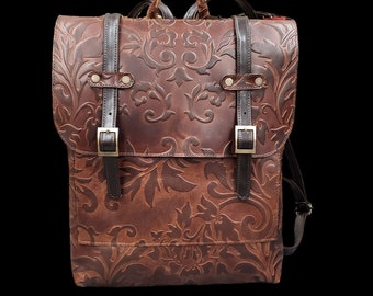 Handmade brown leather backpack.