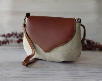 Saddle Bag in Tan Top Grain Leather and Natural European Linen Canvas. Wildwood Crossbody Handbag Purse with Curvy Sweetheart Shaped Flap