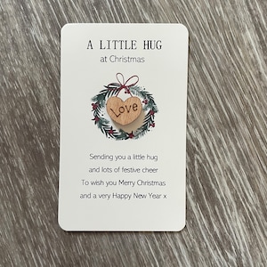 A tiny little Christmas pocket love/hug, perfect to pop inside a Christmas card, token, heart, thinking of you, wreath (Please check size)