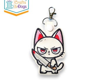 Gato apuñalado con cuchillo, llavero, etiqueta de bolso, tirador de cremallera, dije