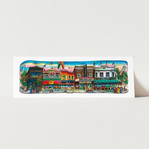 Puede incluir: Una ilustración colorida de una escena de calle con múltiples fachadas de tiendas. Los edificios están pintados en tonos de rojo, azul, verde y amarillo. Hay personas caminando por la acera y algunas bicicletas estacionadas frente a las tiendas. El cielo es azul claro con algunas nubes.