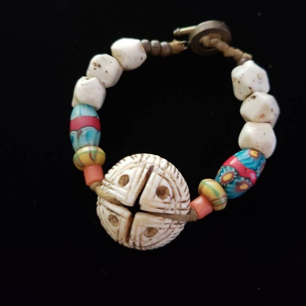 Bracelet. Vintage Collectable African Trade Beads. Vintage Center Carved Shell from the Naga Tribe. Boho. Bohemian. Ethnic. Tribal. Casual.