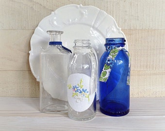 Blue bottle set with white porcelain plate, decorated bottle collection, cobalt blue decor