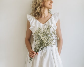 Ethereal Linen A-Line Wedding Dress: Bohemian Forest Goddess Gown for Nature-Inspired Rustic Ceremonies.