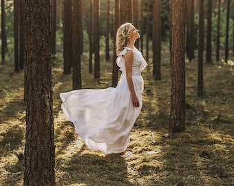 Ethereal A-Line Goddess Wedding Dress: Rustic Forest Linen Gown for Bohemian Brides.