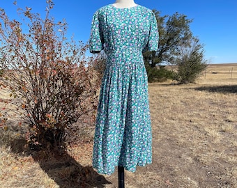 Vestido vintage de manga curta com cintura baixa floral azul-petróleo dos anos 80