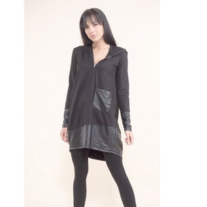 Black blouse with leather element