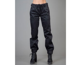 Long black pants with loose legs, made from thick jersey