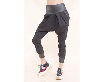 Trendy drop crotch pants with faux leather