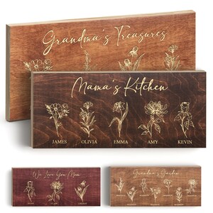 Puede incluir: Cuatro letreros de madera con letras doradas y dise&ntilde;os florales. Los letreros dicen "Grandma's Treasures", "Mama's Kitchen", "We Love You Mom" y "Grandpa's Garden".