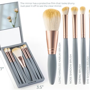 May include: A makeup brush set with a gray case and mirror. The set includes a long-handled Kabuki brush, nose shadow brush, dyeing brush, eye shadow brush, and detail brush. The case is 5.7 inches by 3.5 inches.