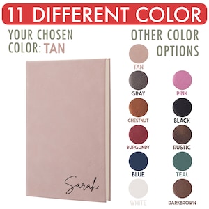 May include: A pink leather-bound journal with the name "Sarah" embossed on the front. The journal is shown against a white background with a selection of 11 different color options for the journal cover.