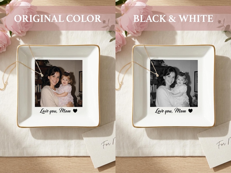 May include: A square white ceramic trinket dish with a gold-toned rim featuring a custom photo of an adult and a child. The text "Love you, Mom" followed by a black heart icon is printed below the photo. A delicate gold chain rests on the dish.