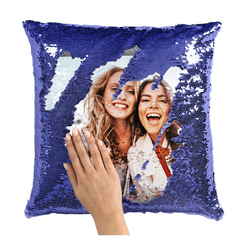 May include: A purple sequin pillow with a photo of two women smiling. The pillow is reversible, with the sequins changing color when flipped.