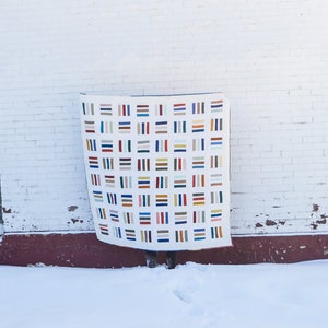 Quiltpatroon met scrappy-lijnen - pdf-download. Een beginnersvriendelijk, minimalistisch quiltpatroon
