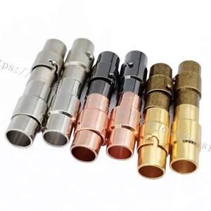 May include: Six magnetic clasps for jewellery making in various finishes: silver, rose gold, black, gold, and antique brass.