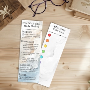 May include: Two white bookmarks with text and colorful dots. One bookmark reads "The SOAP Bible Study Method" and lists steps for scripture study. The other bookmark is labeled "Bible Study Color Code".