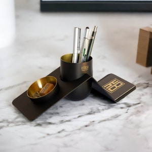 Brass and matte black penholder and desk organizer
