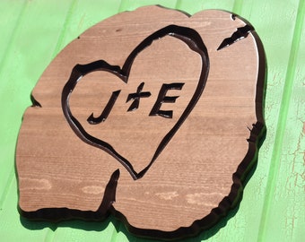 home decor great outdoor decor that is wood carved to look like log slice.  Tree carved initials family's tree or his and hers