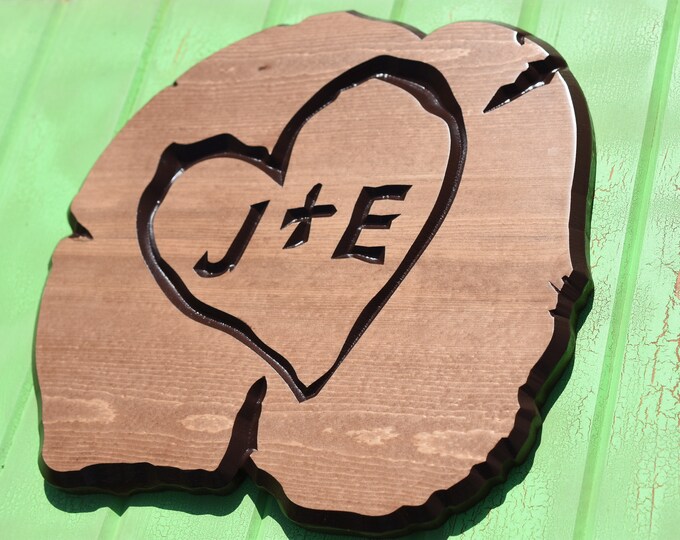 home decor great outdoor decor that is wood carved to look like log slice.  Tree carved initials family's tree or his and hers