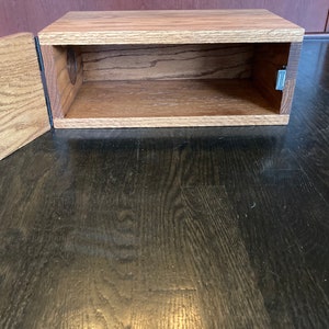 Custom made cable and wire concealment box. Solid oak. Access panel with magnetic catch. Wire/cable opening. Contact me for custom specs.