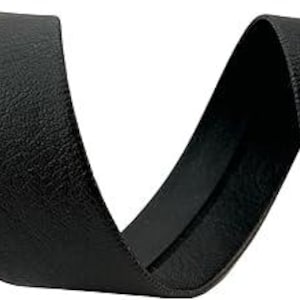 May include: Black faux leather ribbon with a textured surface. The ribbon is approximately 1 inch wide and is shown in a curled shape.