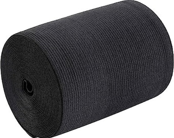 May include: A roll of black elastic fabric. The fabric is ribbed and has a smooth texture.