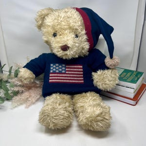 May include: A set of three ceramic mugs with a speckled, matte finish. Each mug features a different color: light blue, cream, and gray. The mugs have a simple, modern design and a comfortable handle.