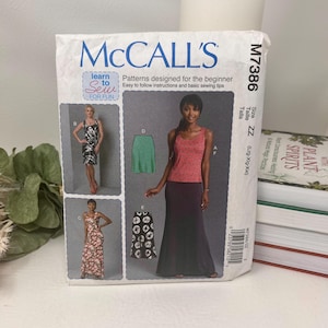 May include: A McCall's M7386 sewing pattern envelope for beginner garments. The front displays illustrations of a sleeveless top and various skirts, including a floral print dress, a solid green skirt, and a long dark skirt with a patterned hem.
