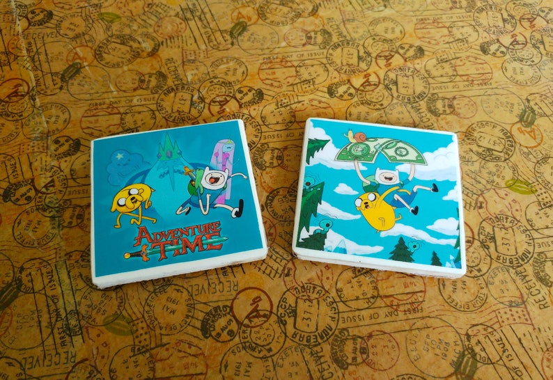 Set of 2 handmade adventure time coasters in colours green and yellow.